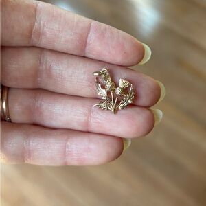Gold thistle charm
